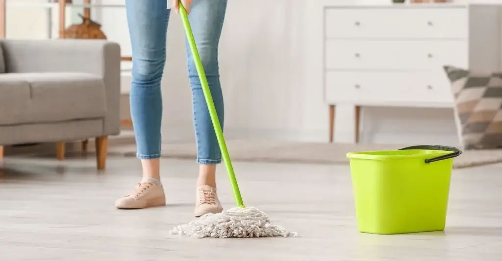 Female mopping a floor