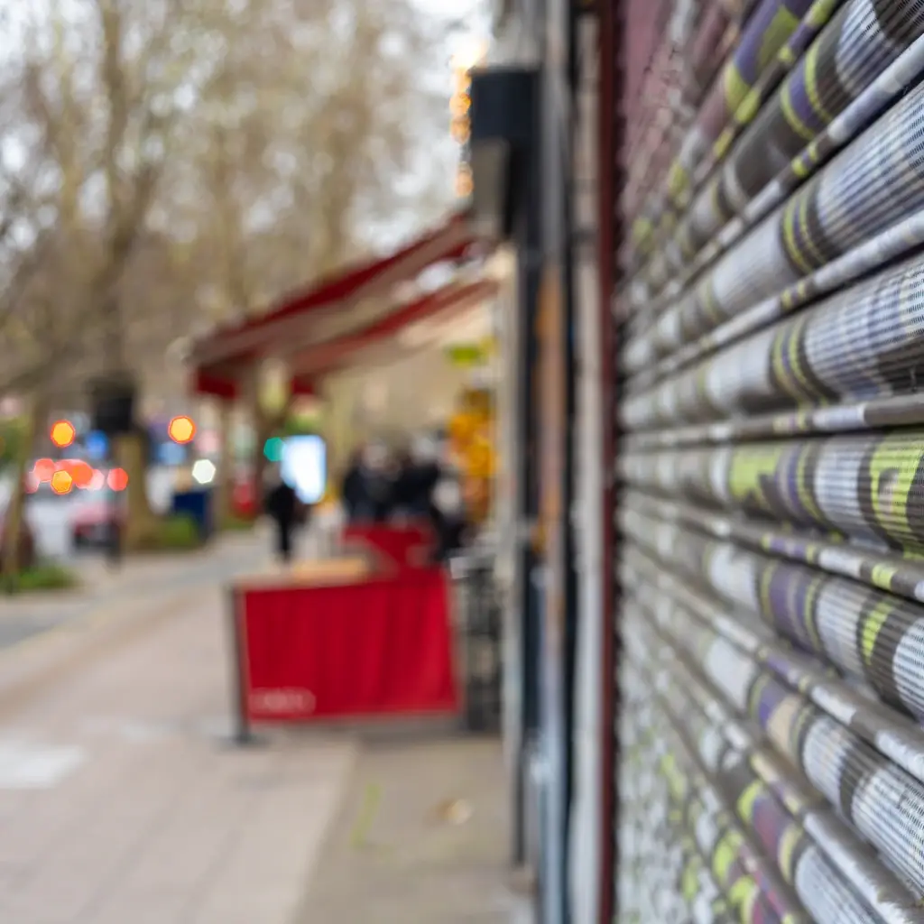 Graffiti on a shop shutter in London.