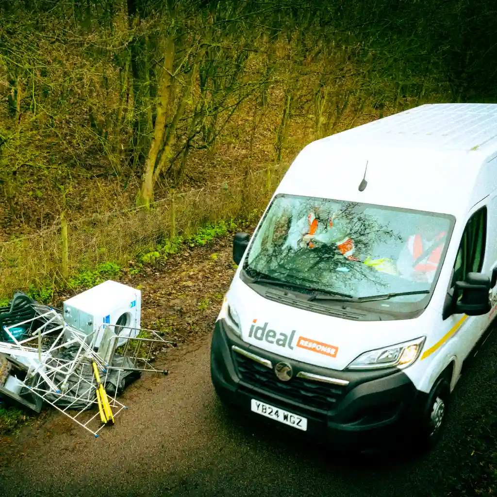 Ideal Response technicians in a van pulling up to a fly-tipping incident